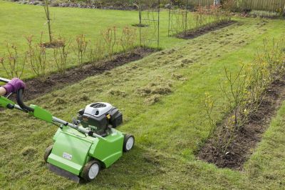 Allow Air, Water, and Nutrients to Penetrate the Soil with Power Raking Service!